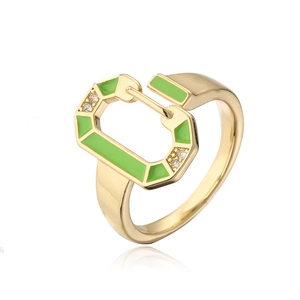 Detail of 18K gold plated ring with green enamel finish and sparkling crystal accents