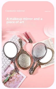 Set of four vintage handheld cosmetic mirrors in bronze, silver, and gold finishes