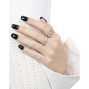 S925 sterling silver rings with crushed texture and diamonds worn on hands