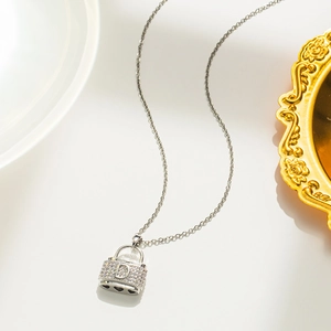 Silver D-letter handbag pendant necklace with pavé cubic zirconia for women