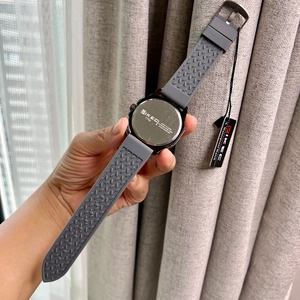 Close-up of VIKEC 1752 watch stainless steel back case and silicone strap detail