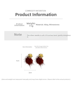 Macro detail of red pom-pom earrings with gold star zircon stud and dimensions 4cm x 3cm