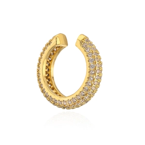 Macro detail of U-shaped ear cuff with pave-set sparkling zircons on gold plating
