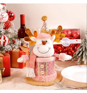 Detailed view of pink reindeer Christmas candy jar with sequins and plush fabric