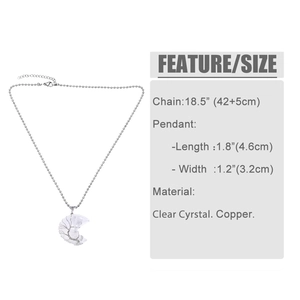Detailed view of the clear crystal moon pendant with dimensions 4.6cm by 3.2cm