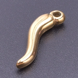 Macro shot of a polished 18k gold-plated chili pendant with glossy metallic texture