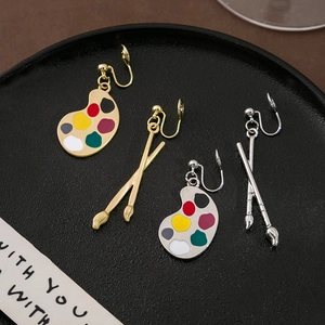 Creative palette and paintbrush clip-on earrings in gold and silver finish with colorful enamel