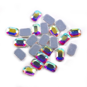 Macro detail of rectangular K9 crystal rhinestones with iridescent AB coating and flat back