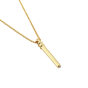 Minimalist gold cylindrical necklace with a sparkling diamond accent on white background