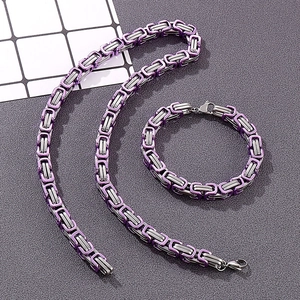 Detail of 8mm silver and purple Byzantine chain necklace and bracelet set with lobster clasp