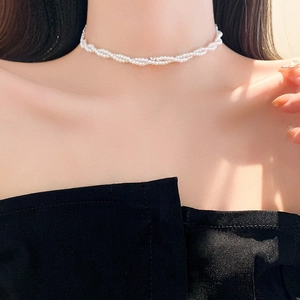Elegant double-layered pearl choker necklace with zircon twist design for women