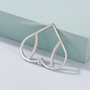 Silver heart-shaped openwork pendant with baseball stitch design on geometric stand