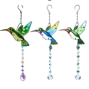 Three hummingbird suncatchers with colorful glass wings and sparkling crystal ball prisms