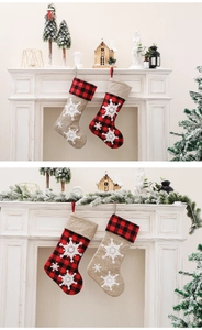 Detail of 22 inch jute and red plaid Christmas stockings with embroidered white snowflakes