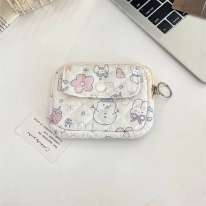Quilted floral coin purse with snap pocket and silver keychain for small item storage