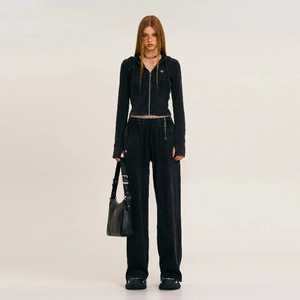 Detailed view of vintage washed cotton hooded zip-up sweatshirt and matching wide-leg trousers