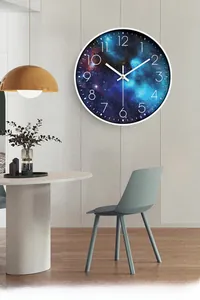 Detail of creative starry sky wall clock with white frame in a minimalist living room