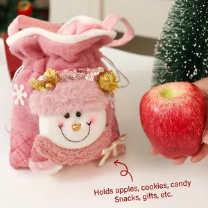 Pink plush Christmas gift bag with a 3D snowman doll and shiny sequins for holiday candy