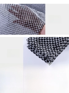 Close-up of dual-sided exfoliating bath towel showing mixed fabric texture and fine stitching