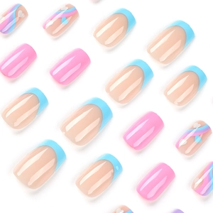 Pink and blue French press-on nails with heart patterns and colorful wavy line designs