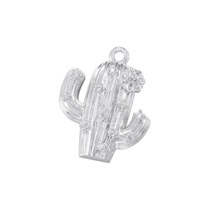 Detailed view of silver cactus pendant with shimmering micro-set gemstone accents