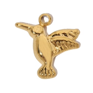 Detailed macro view of a golden hummingbird pendant crafted from durable titanium steel