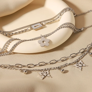 Silver multi-layer Cuban chain necklace with butterfly and flower pendants for women