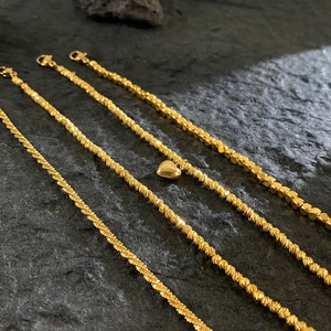 Gold plated titanium steel jewelry set with twisted rope chains and heart pendant