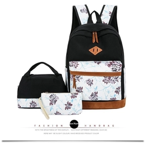 Detailed set of canvas backpack, lunch bag and pencil case with blue floral pattern
