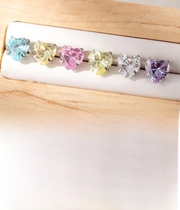 Detailed view of heart-shaped zircon earrings in six colors with titanium steel studs