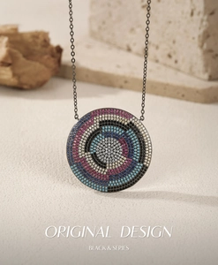 Macro view of retro S925 silver pixel style pendant with colorful inlaid gemstones