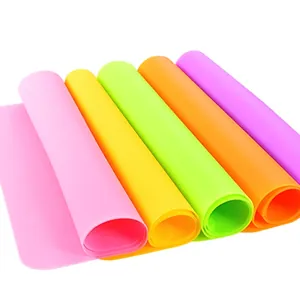 Colorful 30x40cm food grade silicone placemats set in five vibrant rolled-up colors