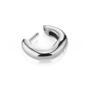Detailed close-up of a chunky silver C-shaped hoop earring with a polished finish