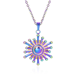 Macro shot of 18k gold plated stainless steel sun pendant with colorful gradient finish