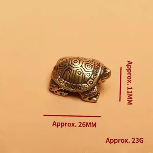 Miniature brass turtle figurine with vintage bronze finish and shell honeycomb texture