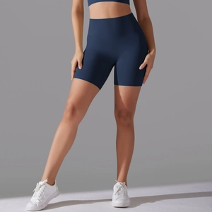Close-up of navy blue high-waisted yoga shorts with seamless design and compression fabric
