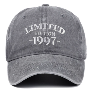 Close-up of white Limited Edition 1997 embroidery on vintage washed grey cotton baseball cap