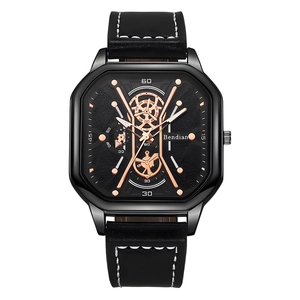 Mens square mechanical watch with black leather strap and rose gold hands on white background