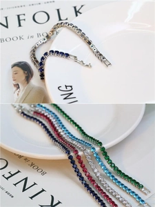 Detailed view of colorful zircon tennis bracelets in five vibrant gemstone shades