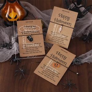 Detailed dimensions of Halloween pumpkin ghost and skull charms on woven bracelets