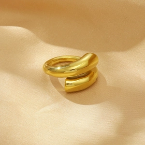 Minimalist gold open ring for women on champagne silk background with high polish finish