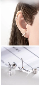 Close-up of starburst cartilage stud with micro-set zircon and threaded screw back