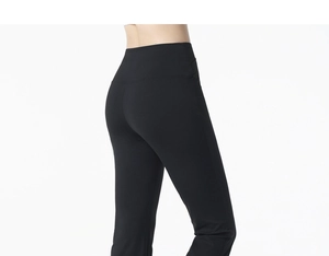 Detail view of high-waist yoga pants with reinforced stitching and tummy control