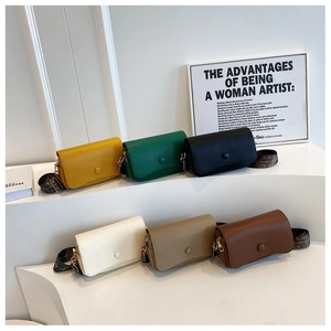 Multiple crossbody PU leather bags in various colors with ethnic wide shoulder straps