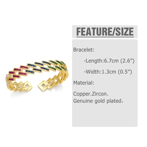 Detail view of gold bangle featuring multi-colored baguette-cut cubic zirconia stones