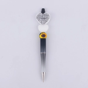 Detail of DIY bead pen featuring Mother theme heart charm and sunflower decoration