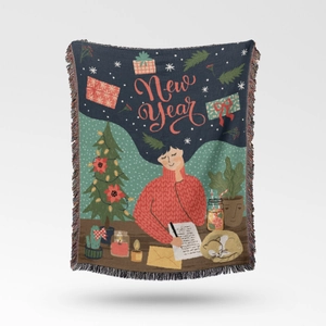 Detailed view of woven Christmas tree throw blanket with New Year pattern and colorful fringe