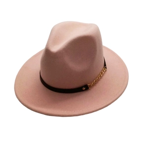 Detail of pink wool fedora hat featuring a black band and decorative gold chain trim