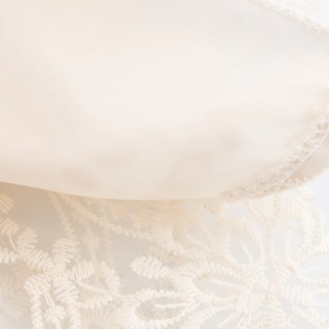 Elegant bohemian lace layered maxi dress featuring floral embroidery and satin texture