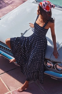 Detail of navy blue floral maxi dress with plaid pattern and matching headscarf